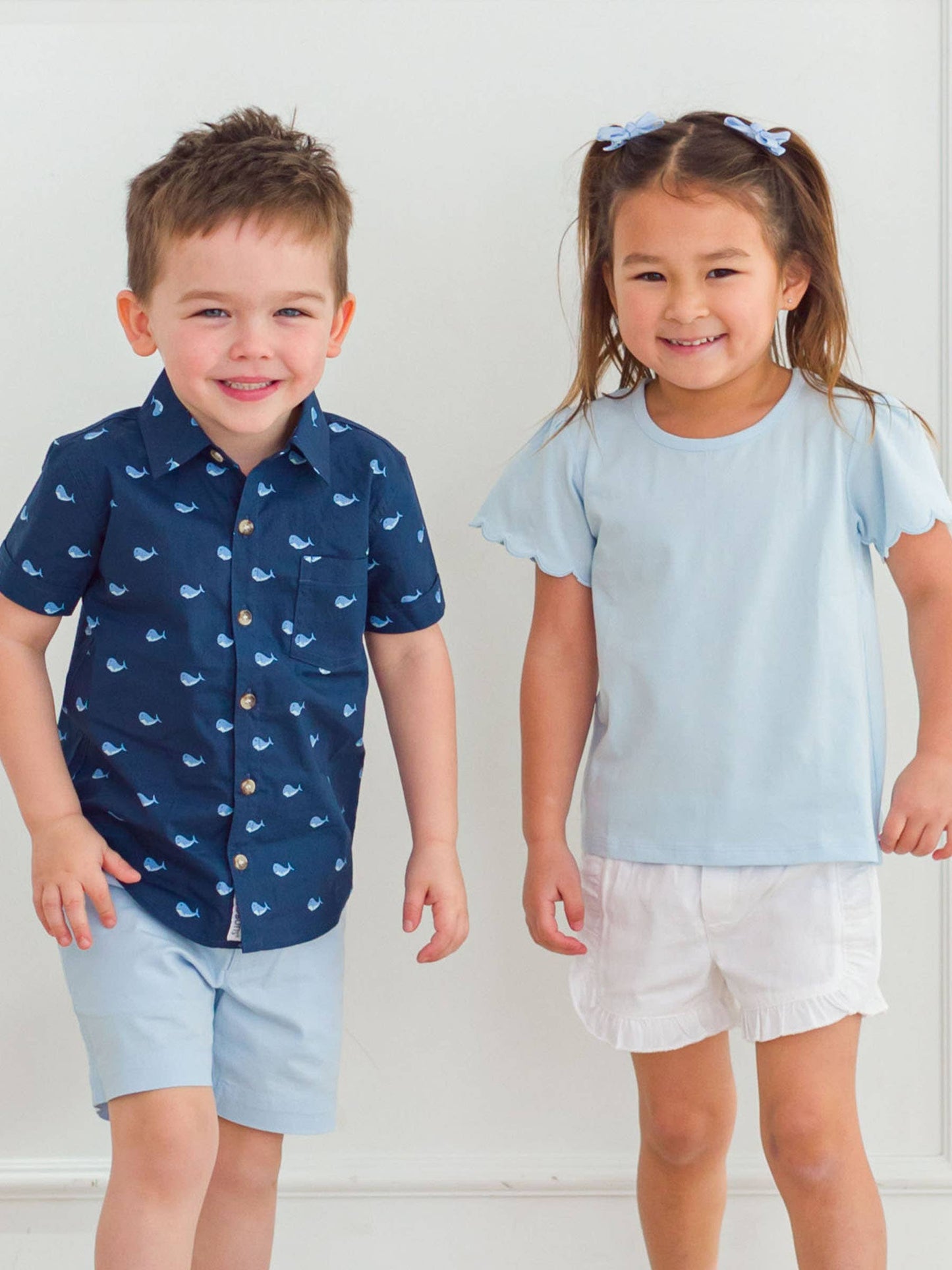 RuffleButts + RuggedButts - Girls Light Blue Knit Short Sleeve Scallop Tee