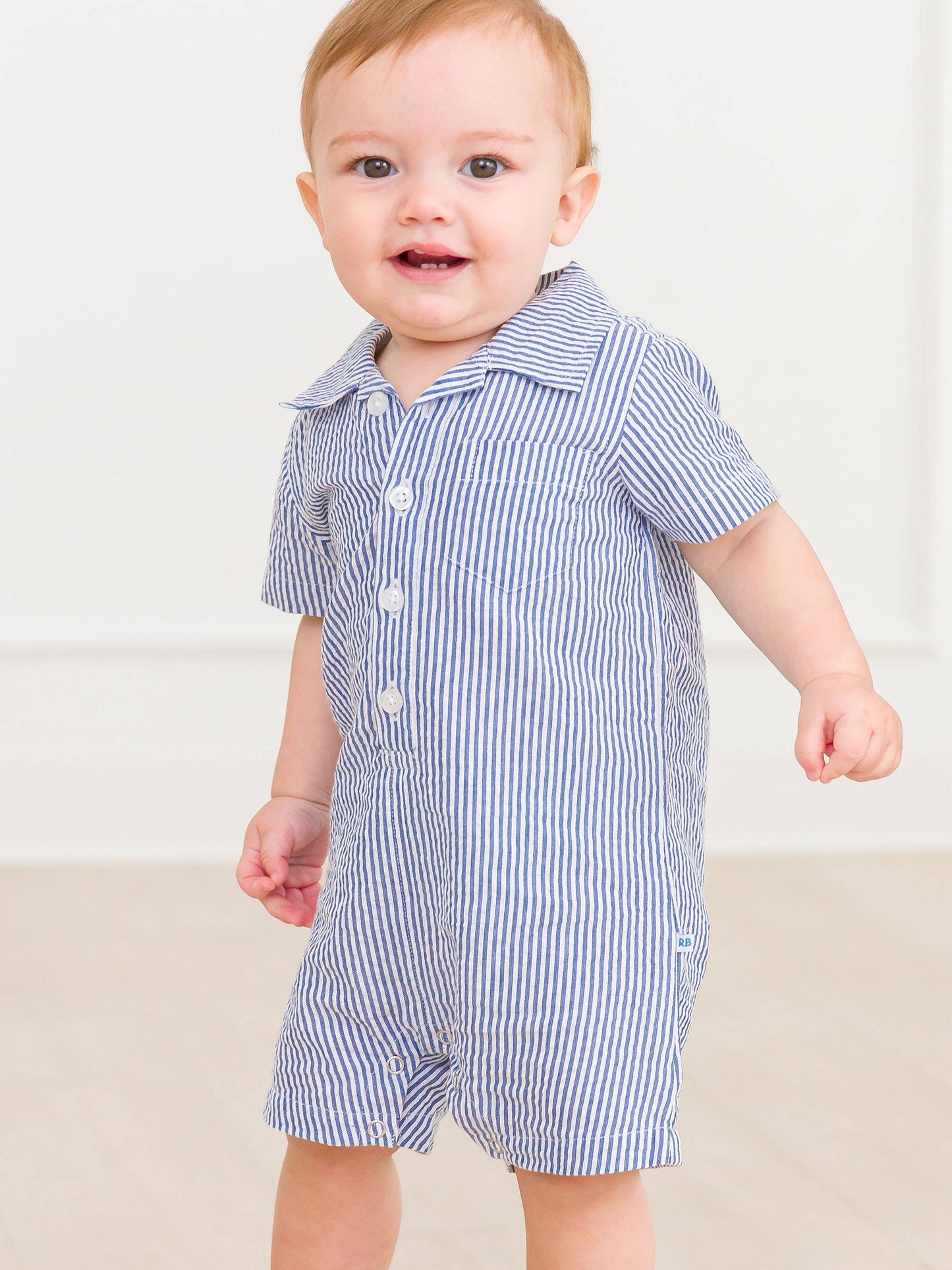 RuffleButts + RuggedButts - Baby Boys Classic Blue Seersucker Button-Up Romper