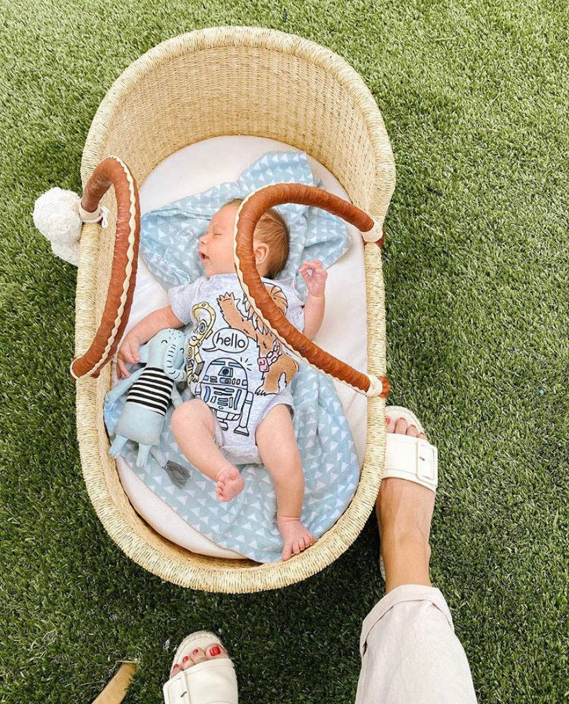 ***Available in-store only!!***Plum & Sparrow - Natural- African Moses Basket - Cognac + Cream Handle/ Mattress, Liner and Pom Pom set included!