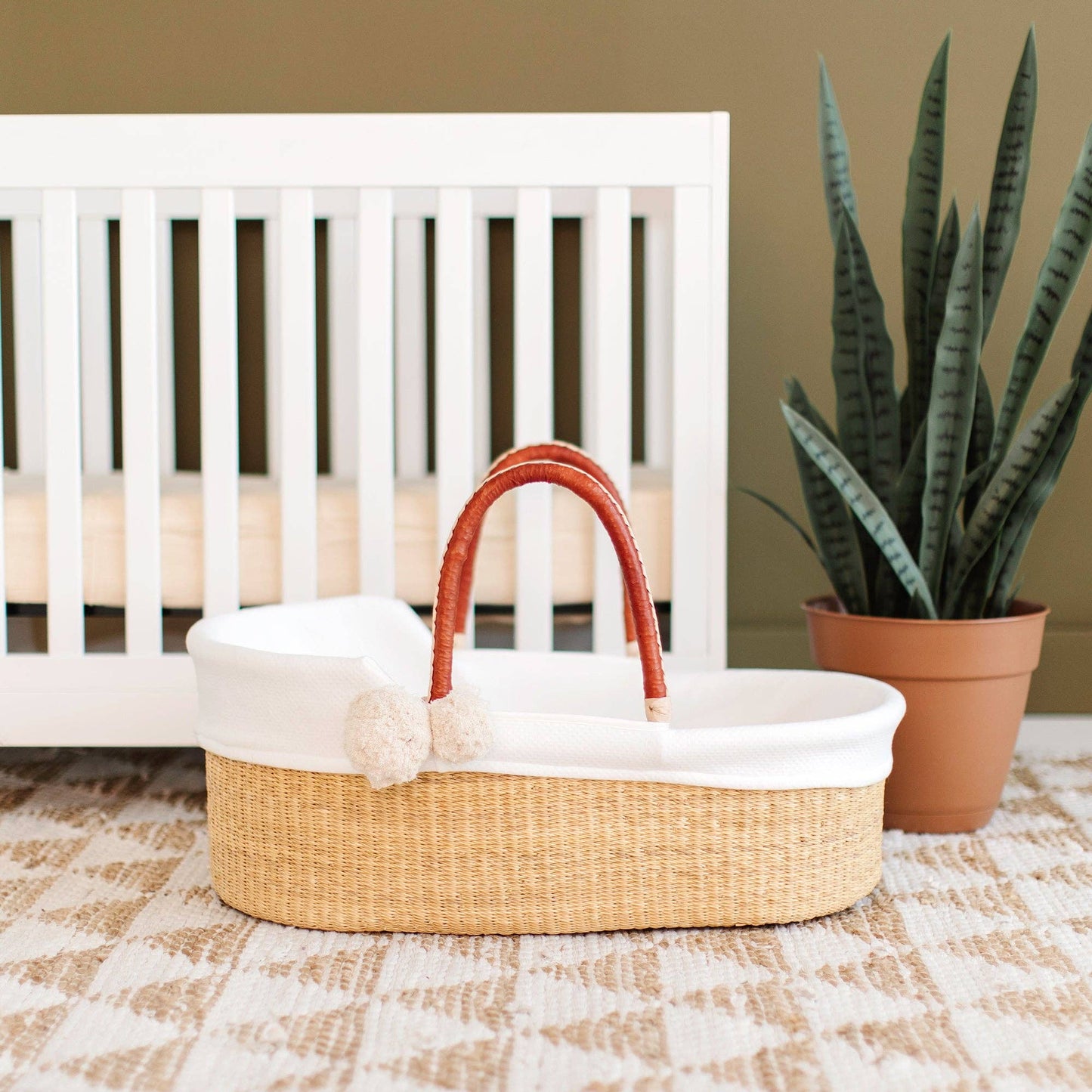 ***Available in-store only!!***Plum & Sparrow - Natural- African Moses Basket - Cognac + Cream Handle/ Mattress, Liner and Pom Pom set included!