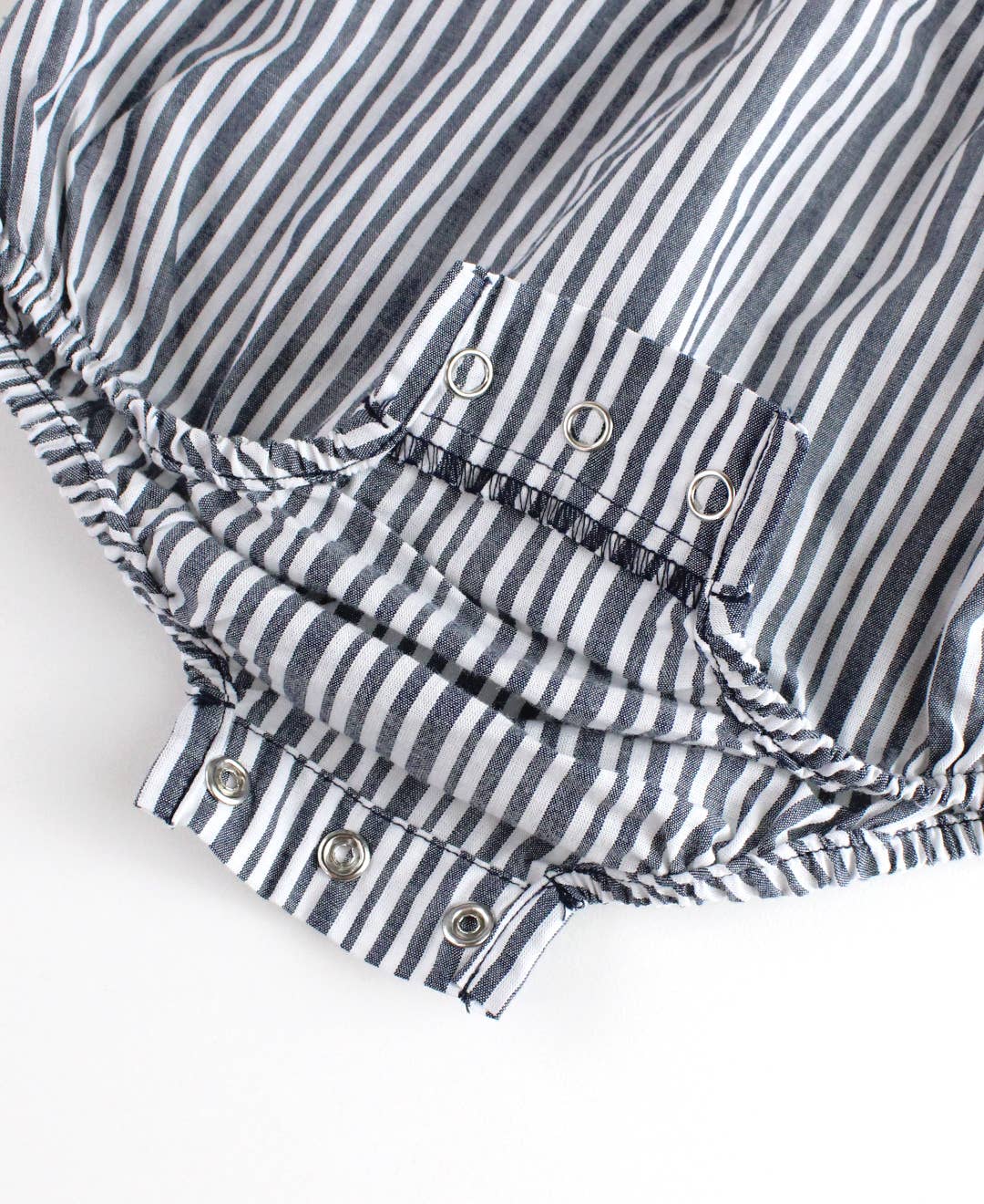 RuffleButts + RuggedButts - Baby Girls Navy Micro Stripe Woven Pinafore Cross-Back Bubble Romper