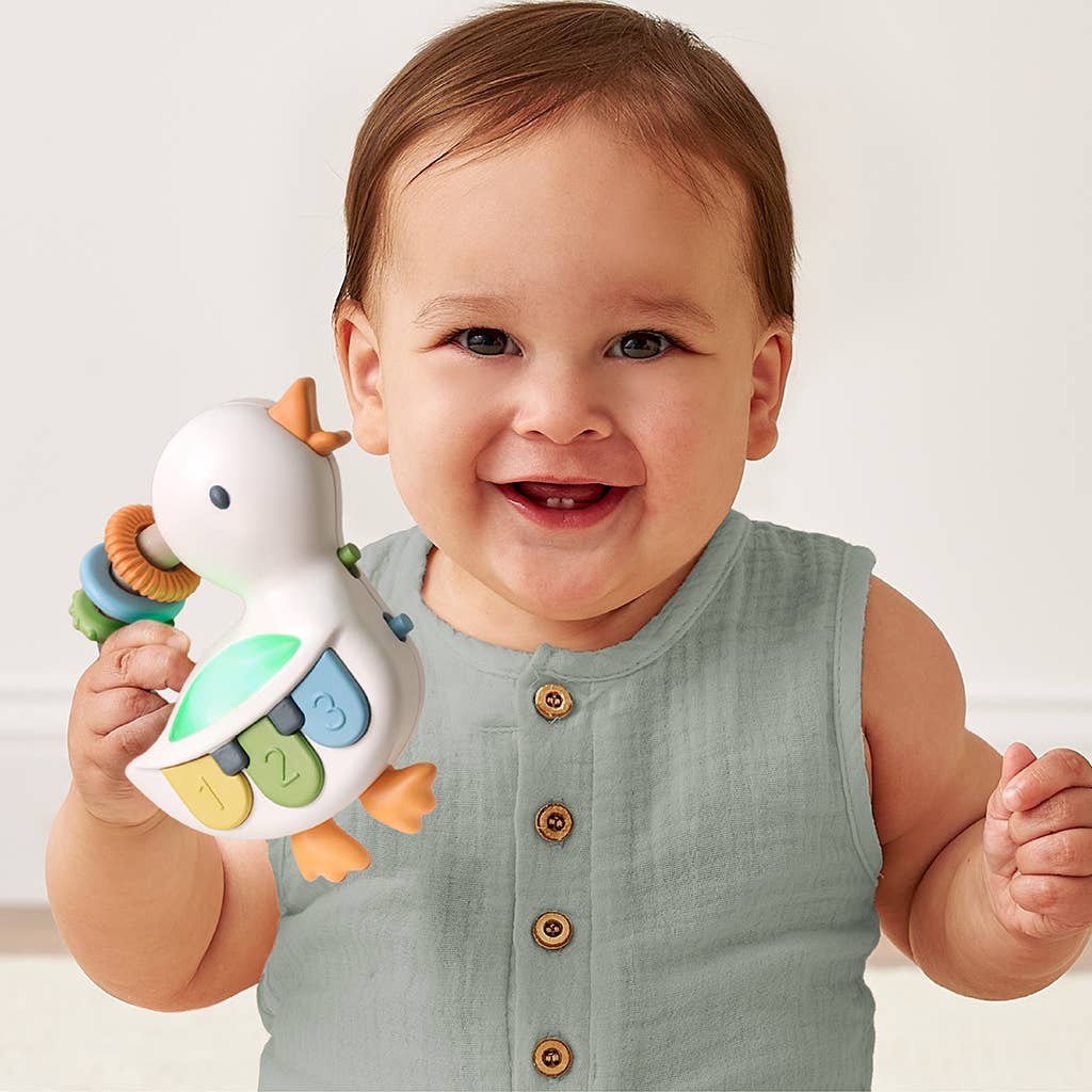Itzy Ritzy - *NEW* Bitzy Tunes™ Goose - Light-up Interactive Piano Toy