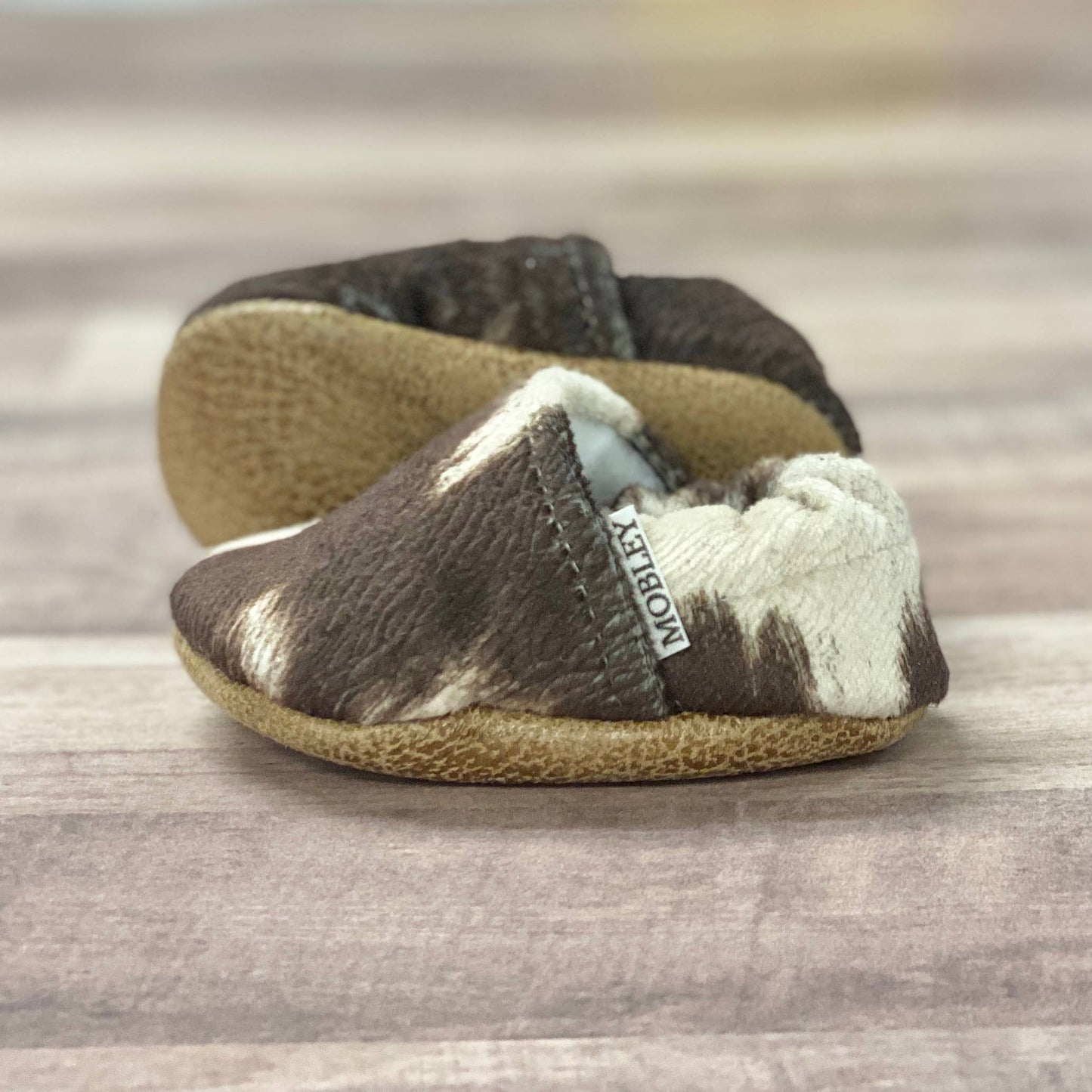 Trendy Baby Mocc Shop - Faux Cow Hide Moccasins