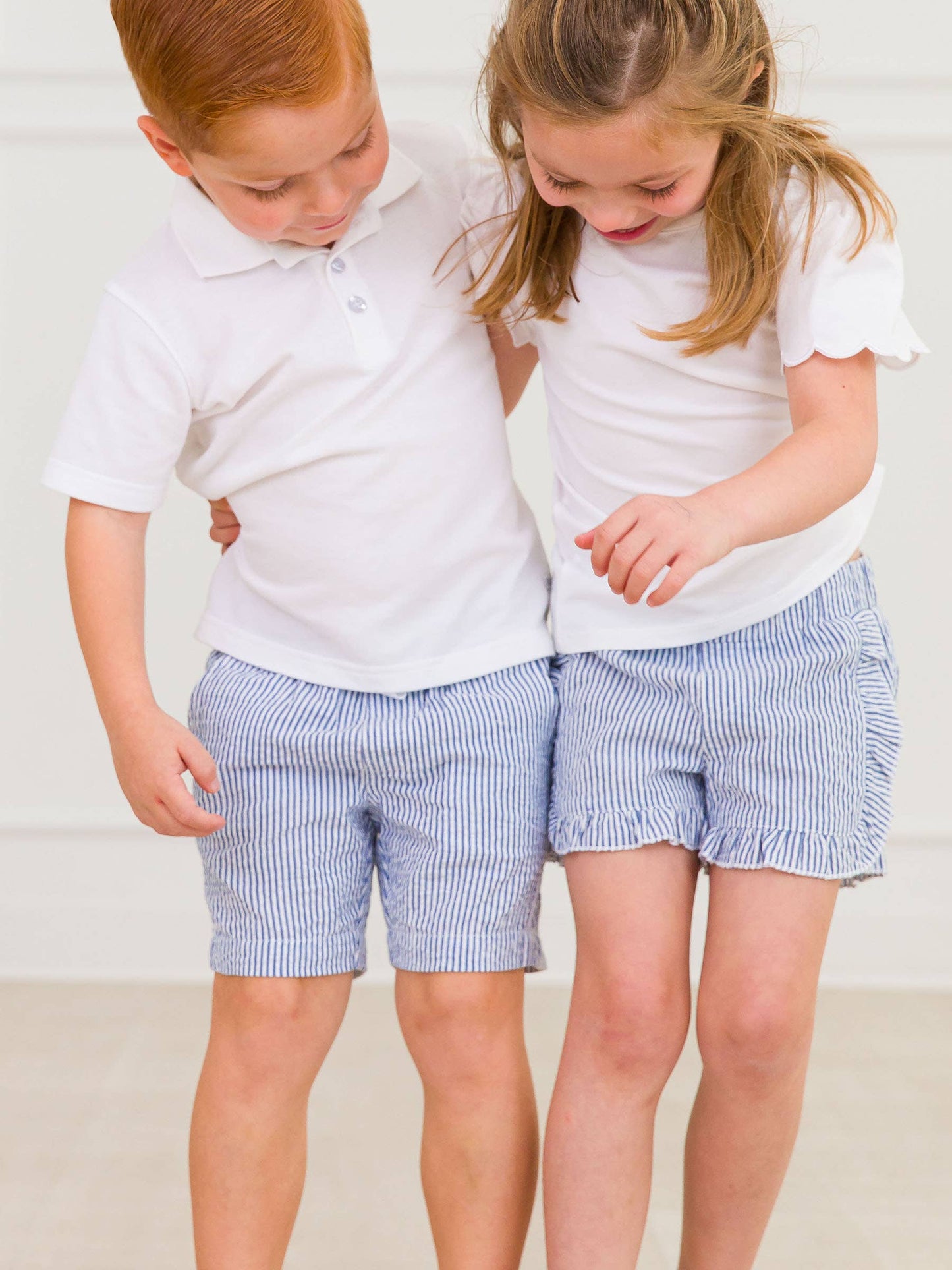 RuffleButts + RuggedButts - Girls Classic Blue Seersucker Ruffle Trim Woven Shorts